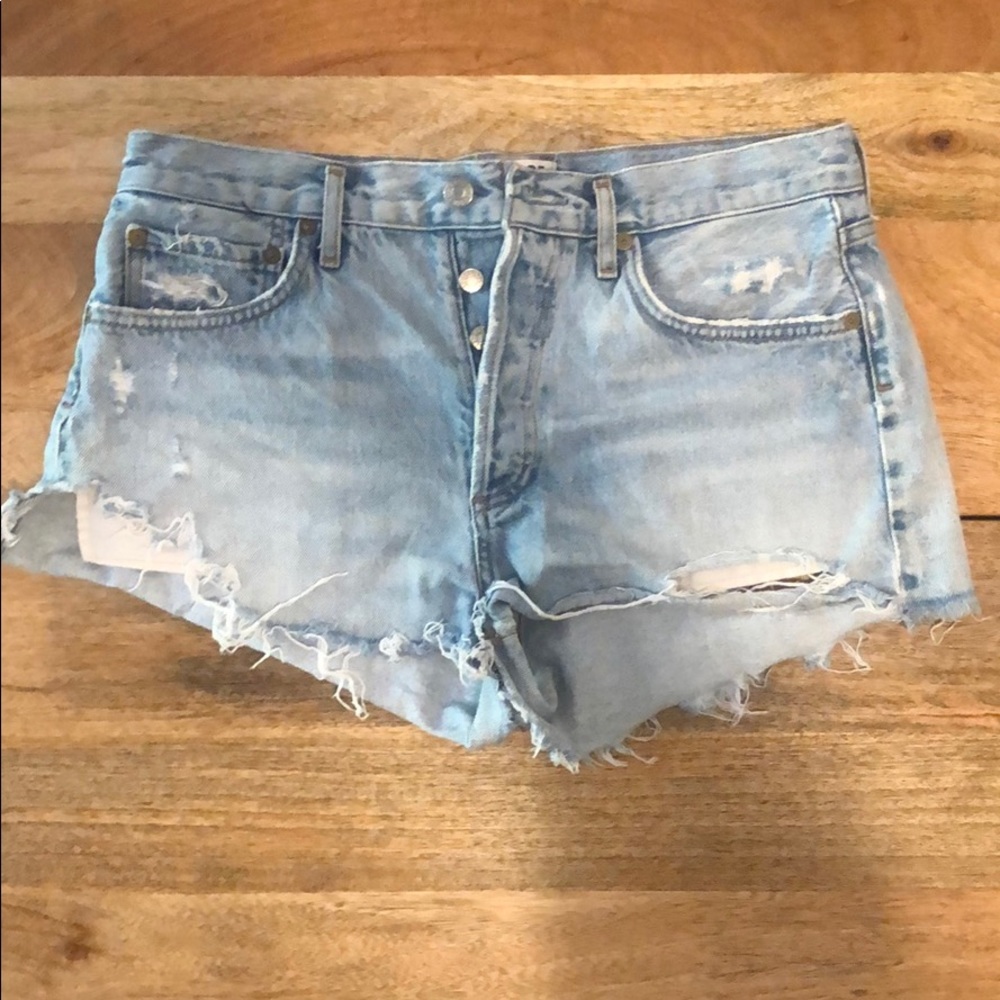 Agolde distressed light wash denim shorts